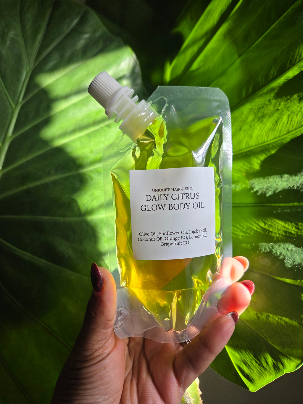 Organic citrus body oil for glowing skin and deep hydration